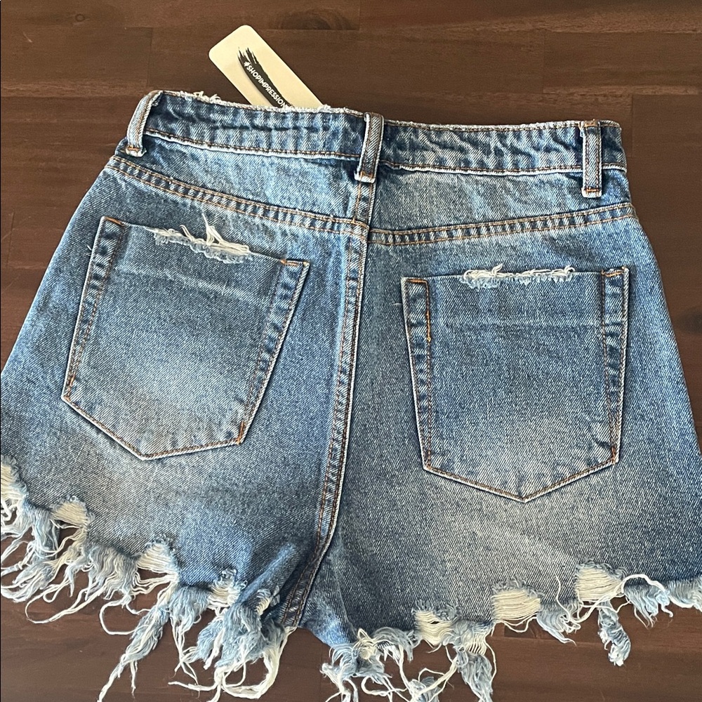Impressions Light Blue Ripped Jean Shorts - Picture 9 of 11